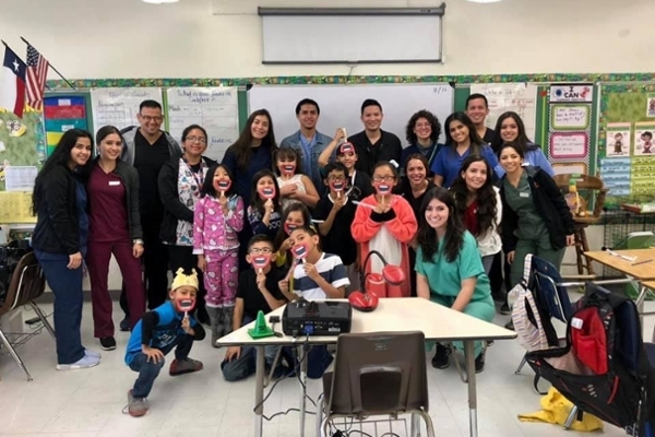PDS members take part in a Dental Hygiene Visit with a third grade class at Roberts Elementary School (November 2018) 
